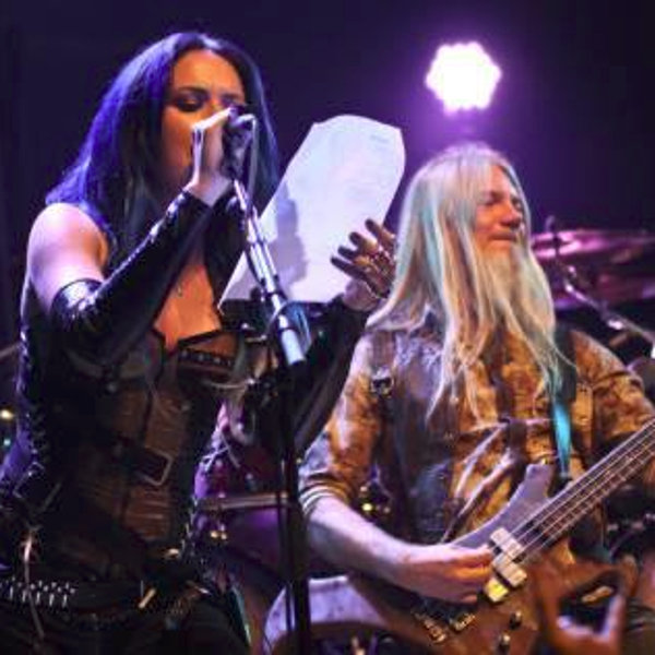 Alissa on stage with Marco Hietala during the Nightwish concert in Denver, the 28th of september, 2013