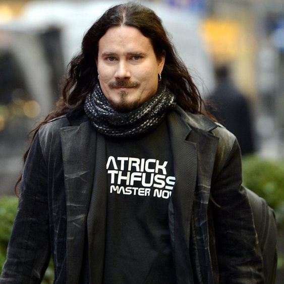 Tuomas wearing a Patrick Rothfuss is my master now tshirt